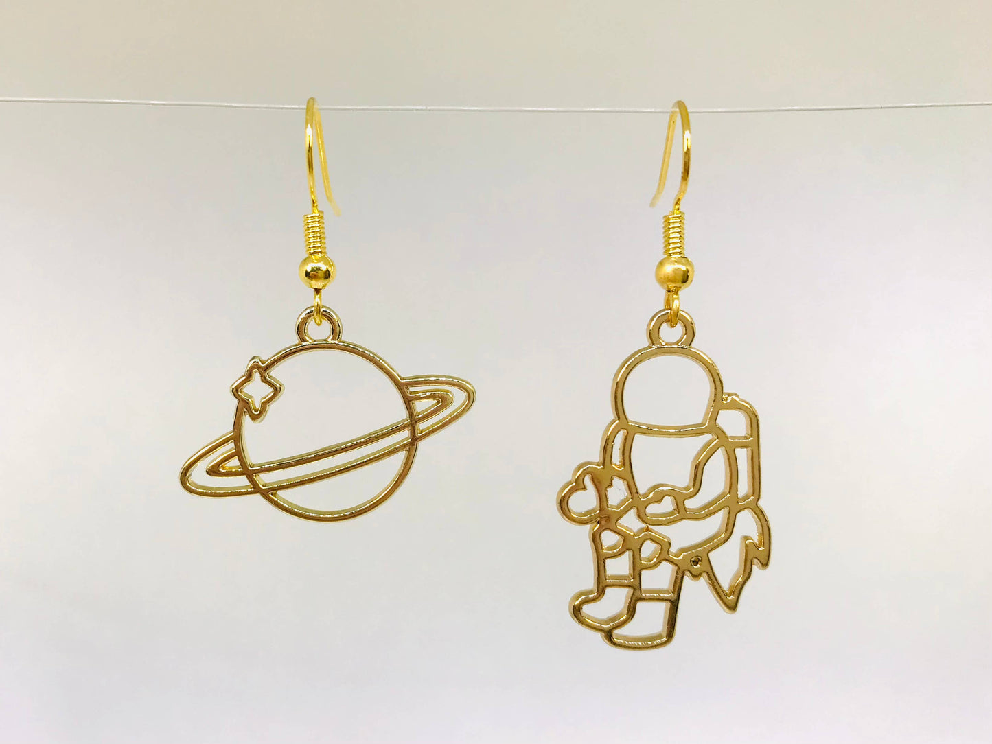 Planet and Astronaut Mismatched Earrings