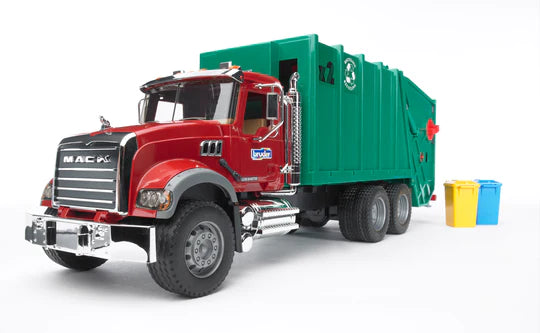 Model red Mack truck with green rear-loading garbage trailer, yellow and blue trashcans sit beside it