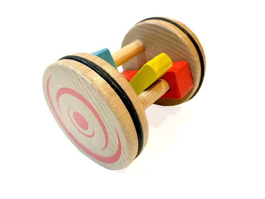 Two wooden discs are separated by columns that hold moveable colored blocks on them