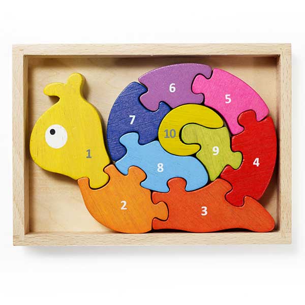 A wooden rainbow snail puzzle sits put together in its box, each piece is labeled with numbers from 1-10