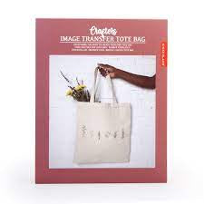 Brick red box shows a hand holding an off-white tote bag that has images of flowers transferred onto it